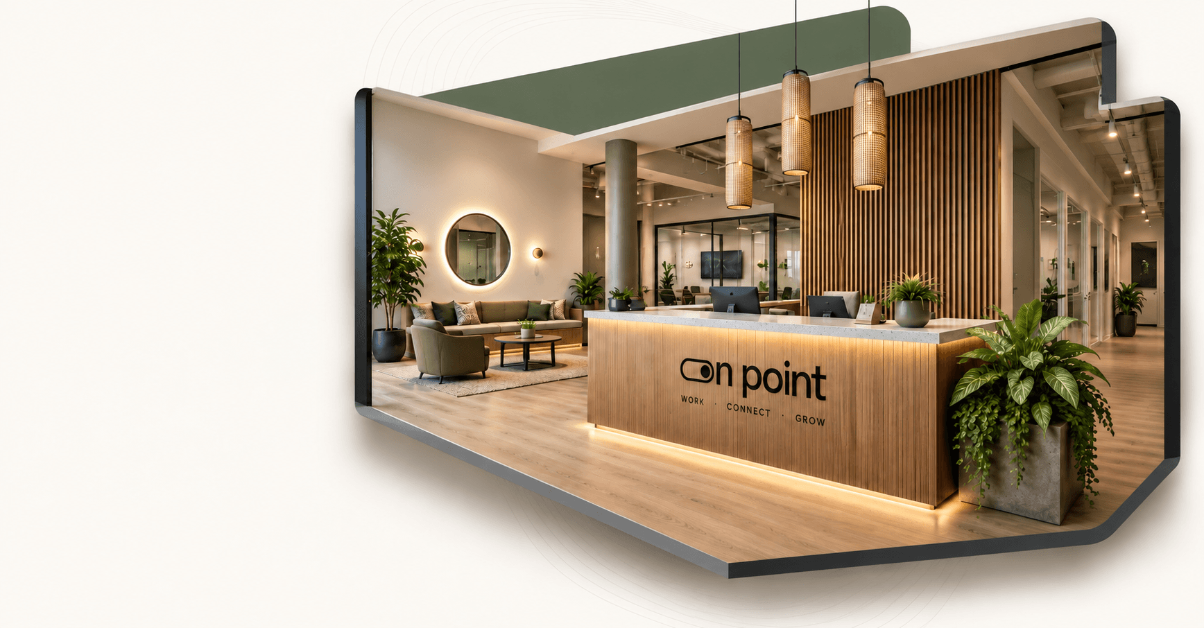 OnPoint reception with a timber welcome desk, warm pendant lighting and a planted lounge